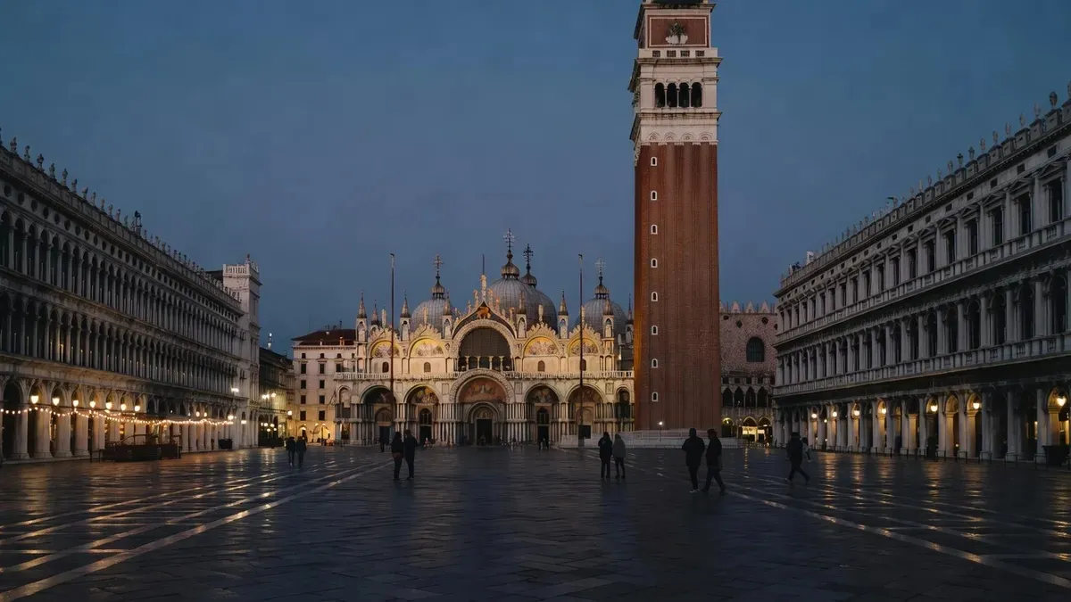 St Mark's Square nearly empty at dusk with the basilica floodlit before a St Marks Basilica night tour in Venice