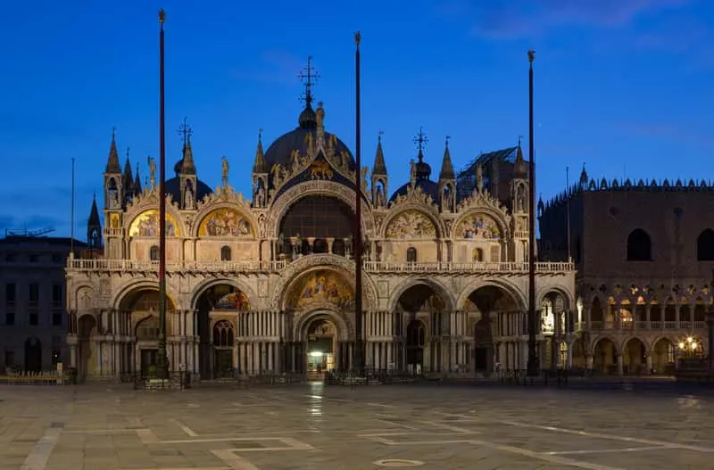 Golden mosaics glowing under evening lights during an exclusive St Mark's Basilica night tour in Venice, Italy